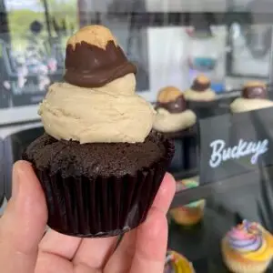 Chocolate Cupcake with peanut butter icing and buckeye candy garnish