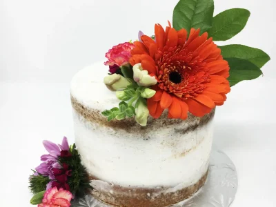 Rustic buttercream cake with floral decoration from a local vendor